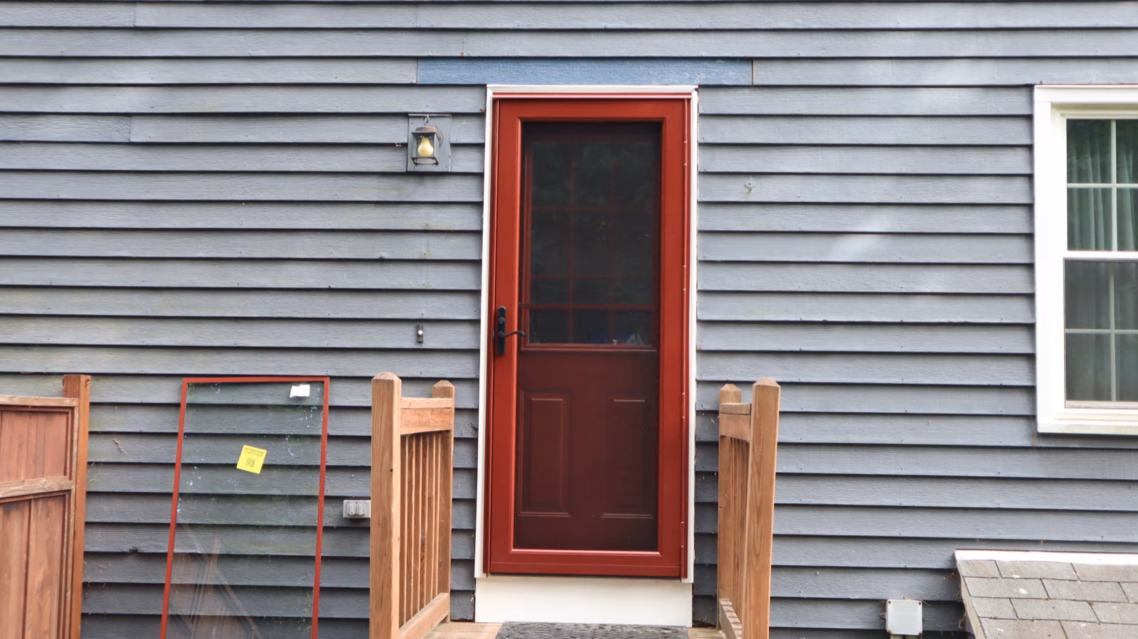 Finished exterior door with full-view storm door
