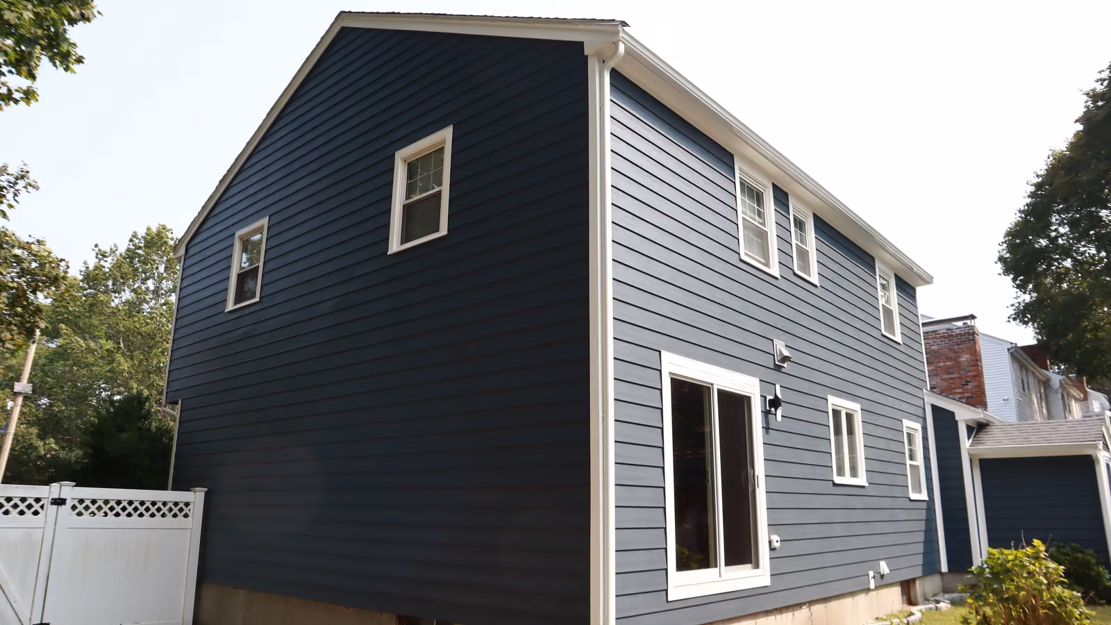 Side elevation of the navy lap siding in Newton
